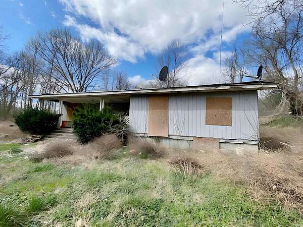 6.69 Acres of Land with Home for Sale in Cannelton, Indiana