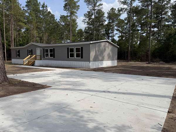 3 Acres of Land with Home for Sale in Loris, South Carolina