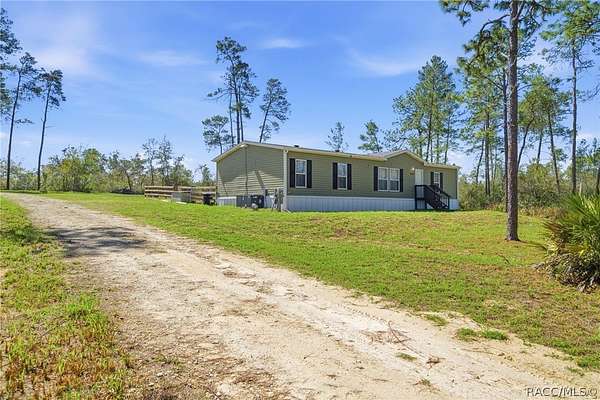 5.27 Acres of Land with Home for Sale in Dunnellon, Florida