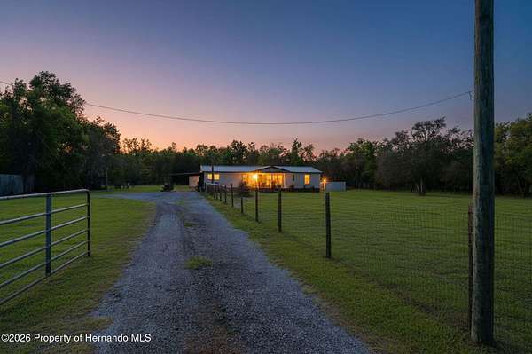 2.1 Acres of Land with Home for Sale in Spring Hill, Florida