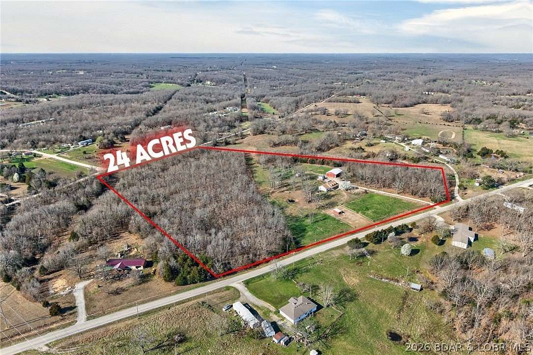 23.4 Acres of Agricultural Land with Home for Sale in Lebanon, Missouri