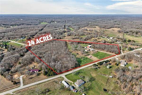 23.4 Acres of Agricultural Land with Home for Sale in Lebanon, Missouri