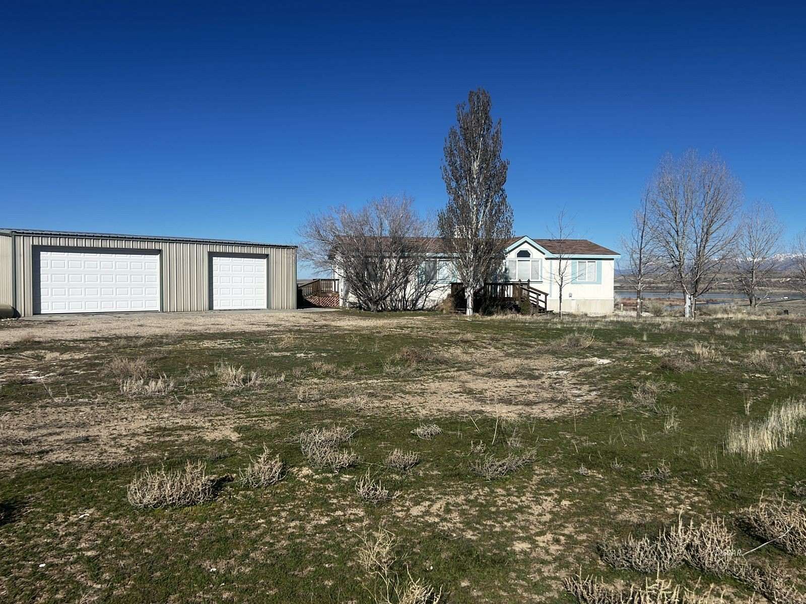 2 Acres of Land with Home for Sale in Spring Creek, Nevada