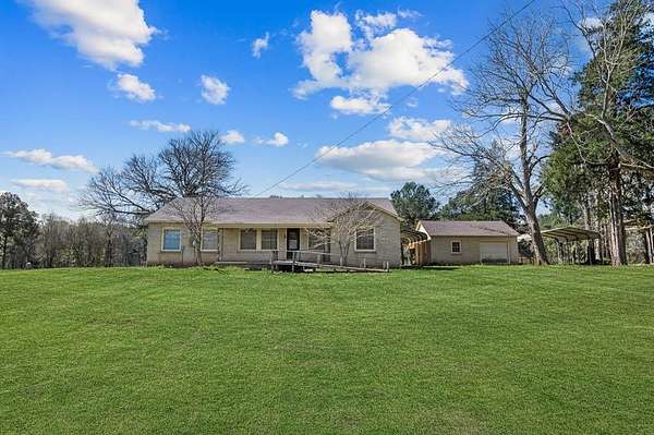 2.77 Acres of Land with Home for Sale in Douglass, Texas