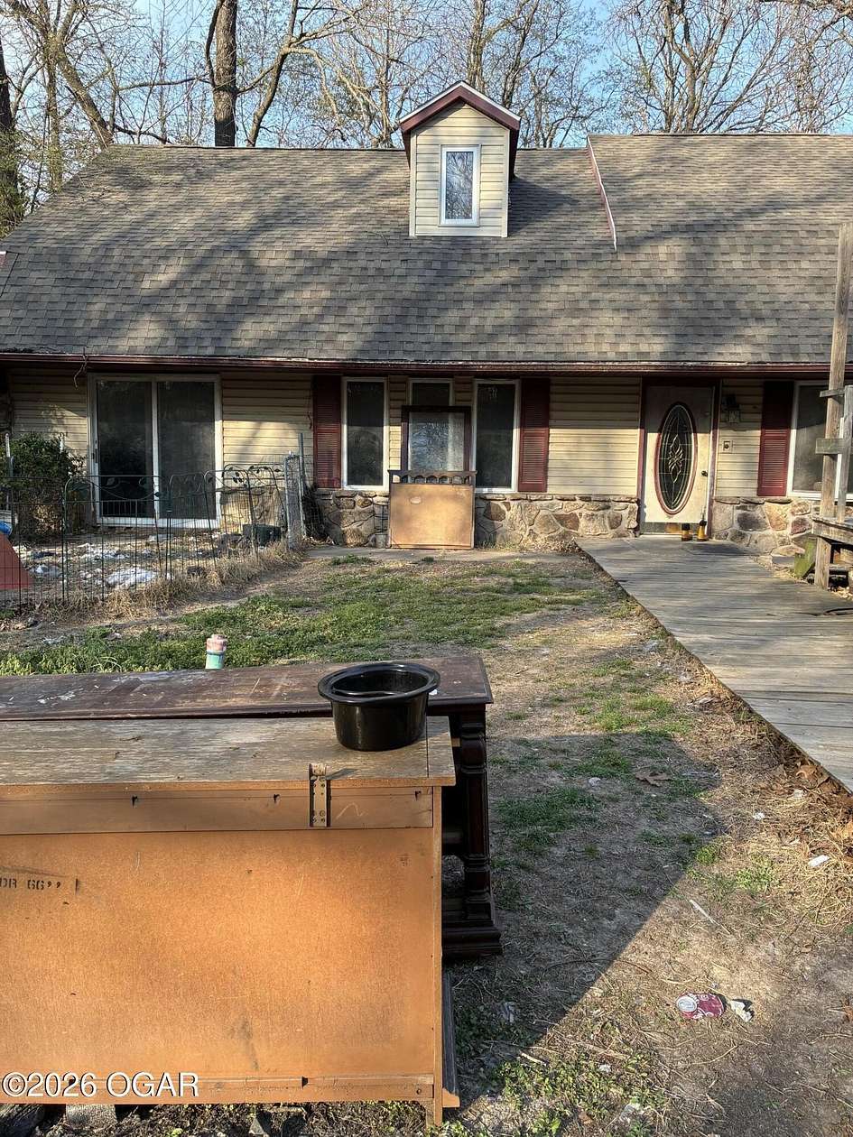 6 Acres of Land with Home for Sale in Granby, Missouri