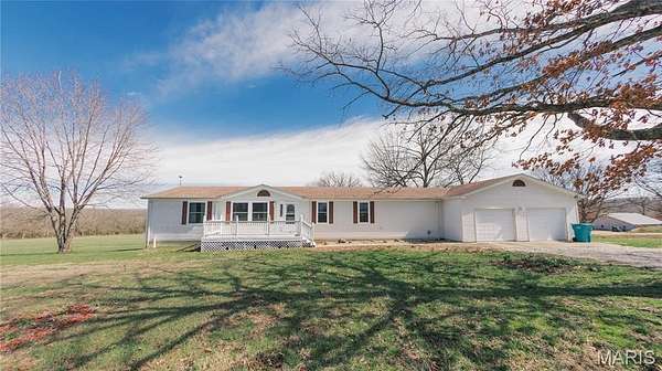 13.8 Acres of Land with Home for Sale in Bland, Missouri