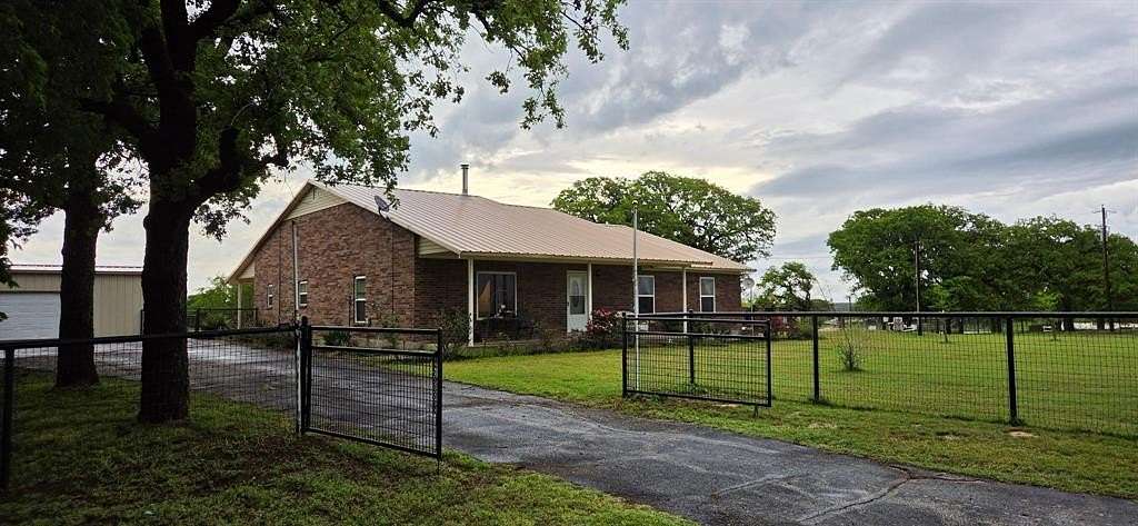 14 Acres of Land with Home for Sale in Springtown, Texas