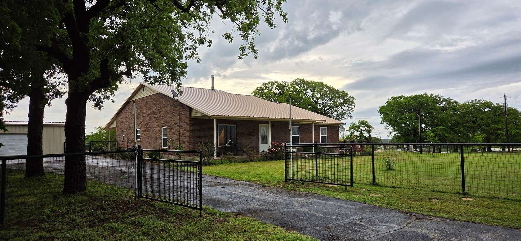 14 Acres of Land with Home for Sale in Springtown, Texas