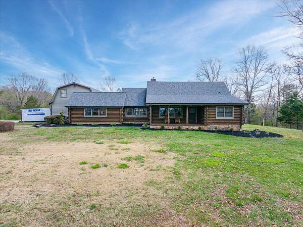 6.47 Acres of Land with Home for Sale in Englewood, Tennessee