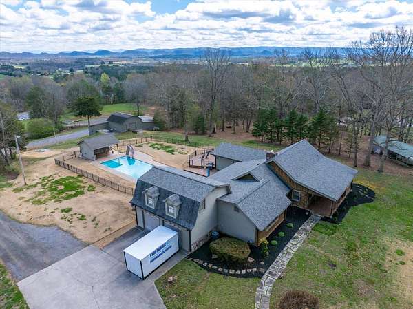 6.47 Acres of Land with Home for Sale in Englewood, Tennessee