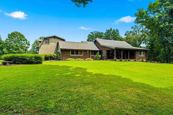 6.47 Acres of Land with Home for Sale in Englewood, Tennessee