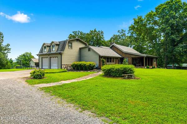 6.47 Acres of Land with Home for Sale in Englewood, Tennessee