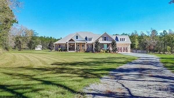 20 Acres of Agricultural Land with Home for Sale in Pace, Florida