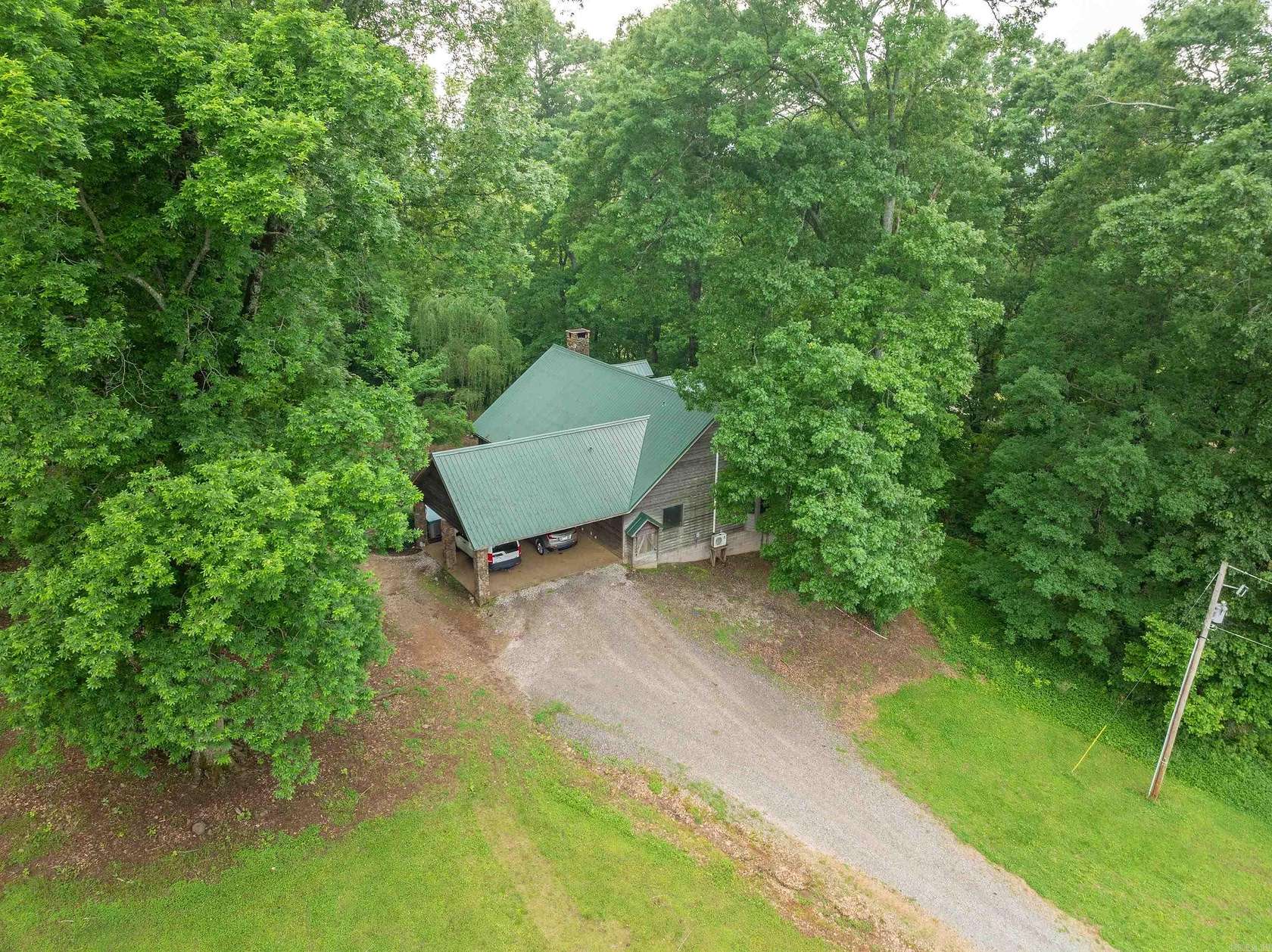 7.6 Acres of Land with Home for Sale in Malvern, Arkansas