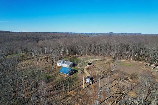12.8 Acres of Recreational Land with Home for Auction in Liberty, Kentucky