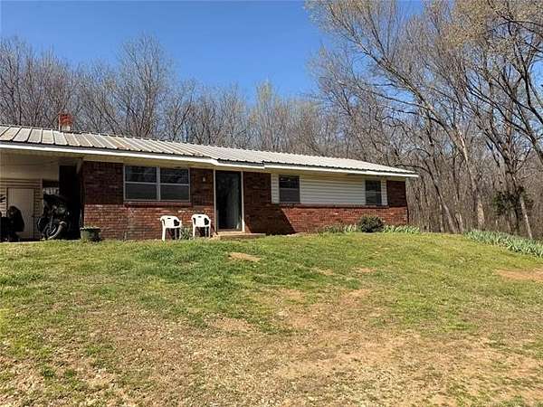 10 Acres of Land with Home for Sale in Hulbert, Oklahoma