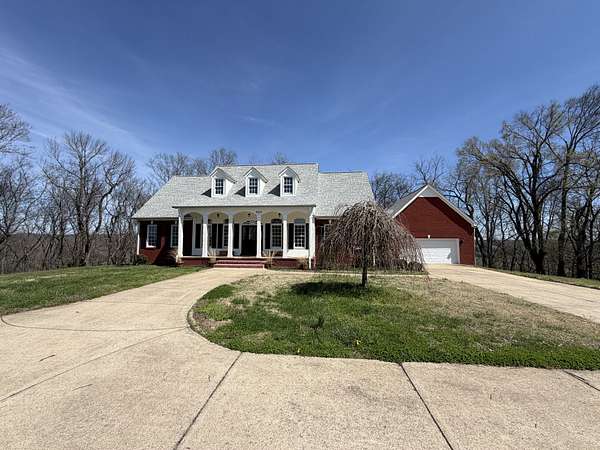 5 Acres of Land with Home for Sale in Santa Fe, Tennessee