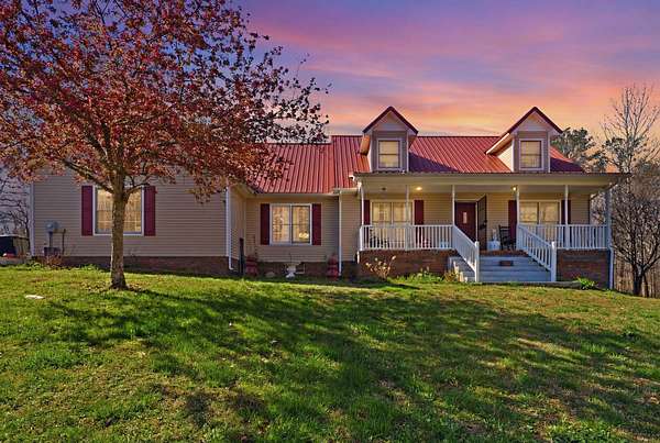 14.4 Acres of Land with Home for Sale in Summertown, Tennessee