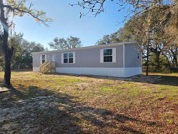 1.64 Acres of Land with Home for Sale in Williston, Florida