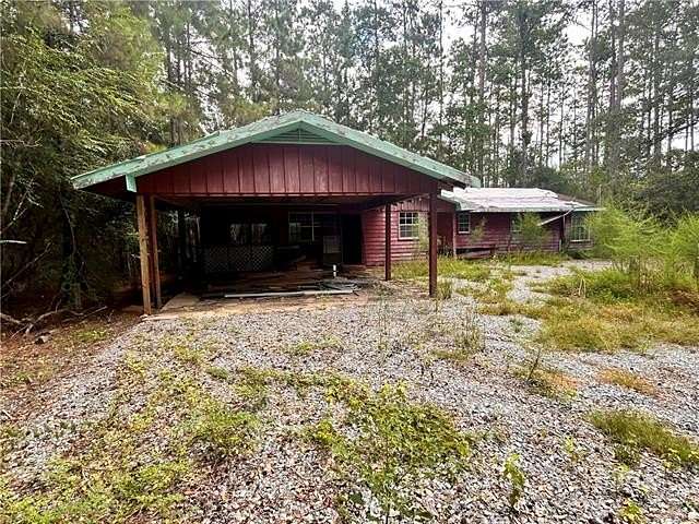 2.67 Acres of Land with Home for Sale in Lacombe, Louisiana