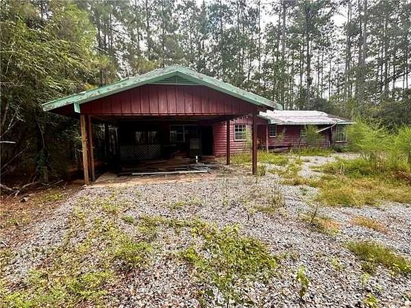 2.67 Acres of Land with Home for Sale in Lacombe, Louisiana