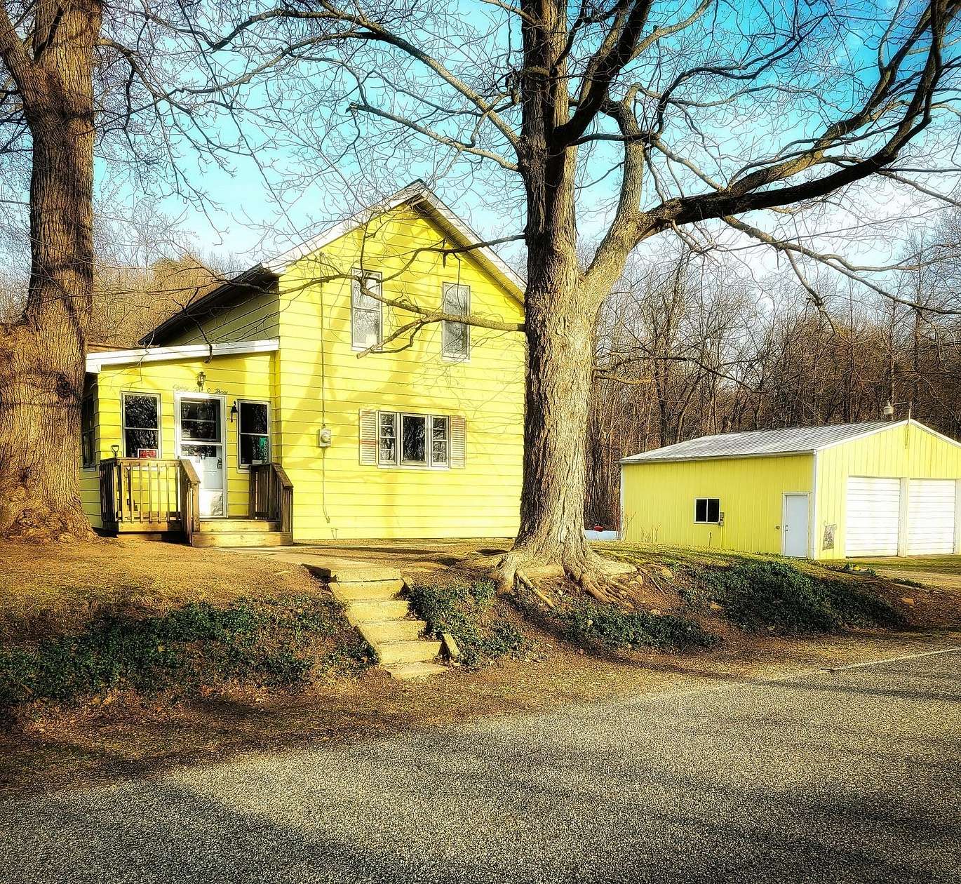 10 Acres of Land with Home for Sale in Rives Junction, Michigan