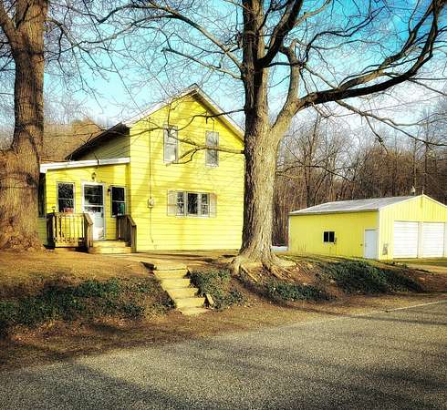 10 Acres of Land with Home for Sale in Rives Junction, Michigan