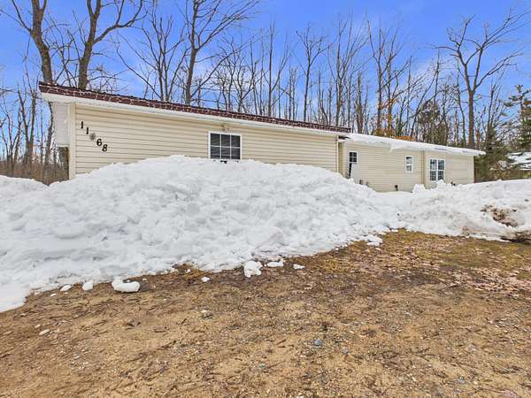 1.7 Acres of Land with Home for Sale in Frederic, Michigan