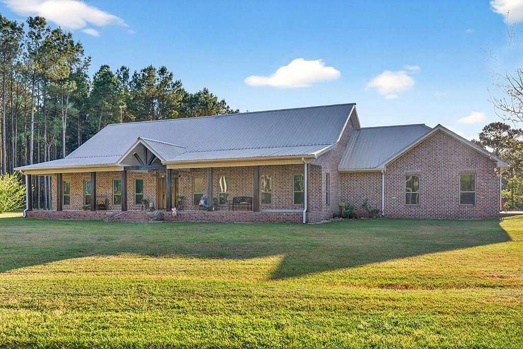 15 Acres of Land with Home for Sale in Sandy Hook, Mississippi