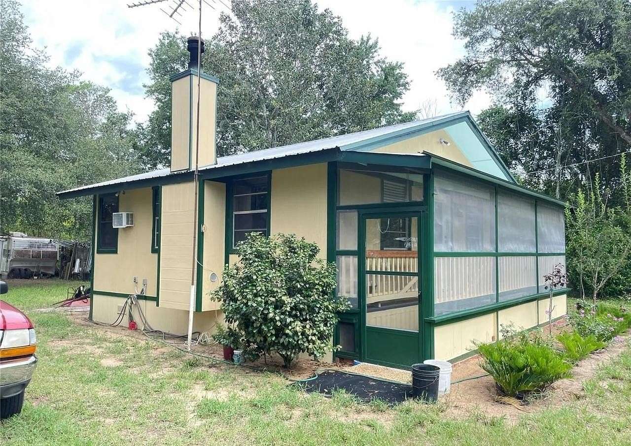 0.73 Acres of Land with Home for Auction in Fort McCoy, Florida