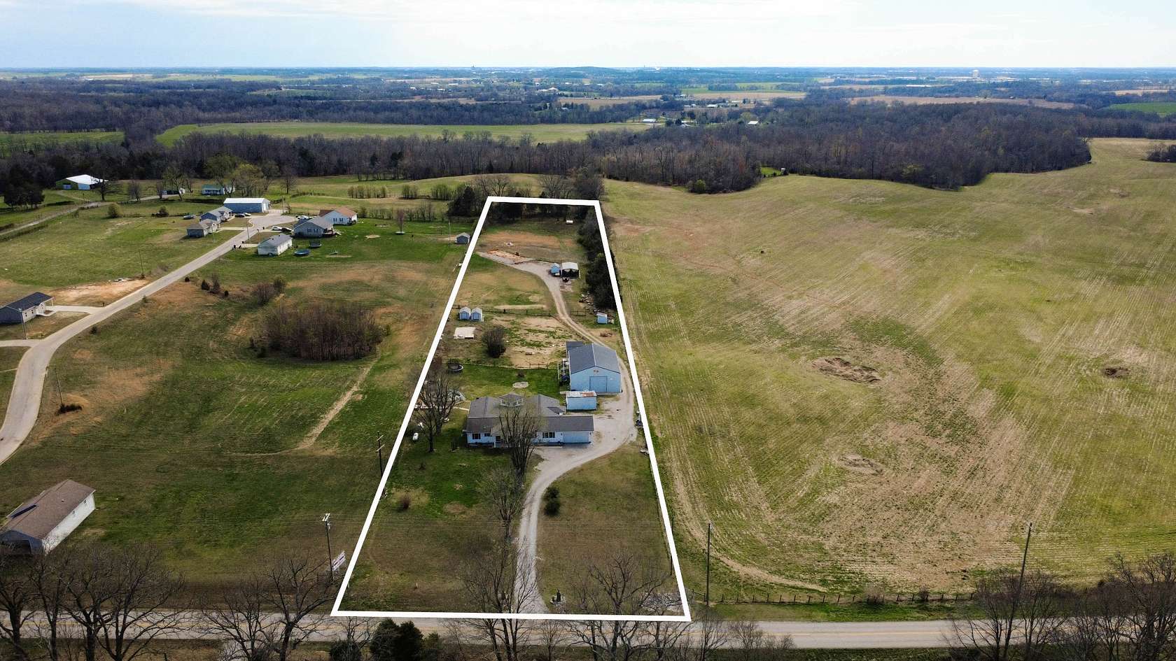 4.87 Acres of Land with Home for Auction in Hopkinsville, Kentucky