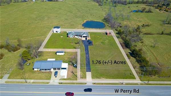 1.76 Acres of Land with Home for Sale in Rogers, Arkansas