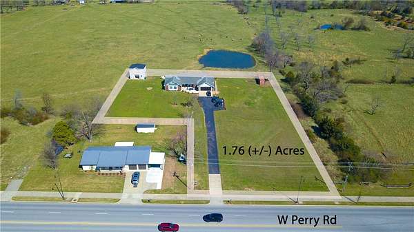 1.76 Acres of Land with Home for Sale in Rogers, Arkansas
