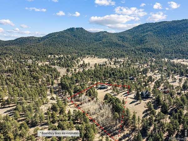 4 Acres of Land with Home for Sale in Estes Park, Colorado