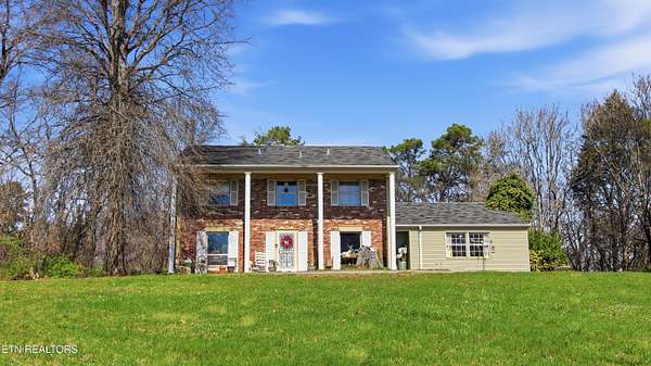 4.86 Acres of Land with Home for Sale in Strawberry Plains, Tennessee