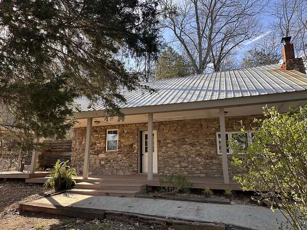 5.3 Acres of Land with Home for Sale in Lampe, Missouri