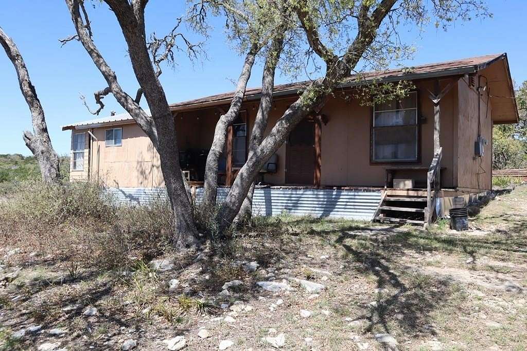 20.3 Acres of Recreational Land with Home for Sale in Rocksprings, Texas