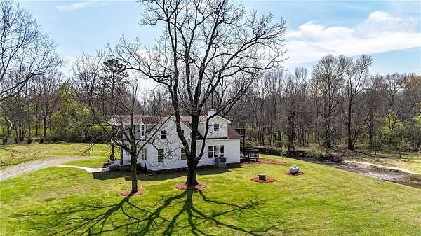 23.3 Acres of Land with Home for Sale in Sugar Valley, Georgia