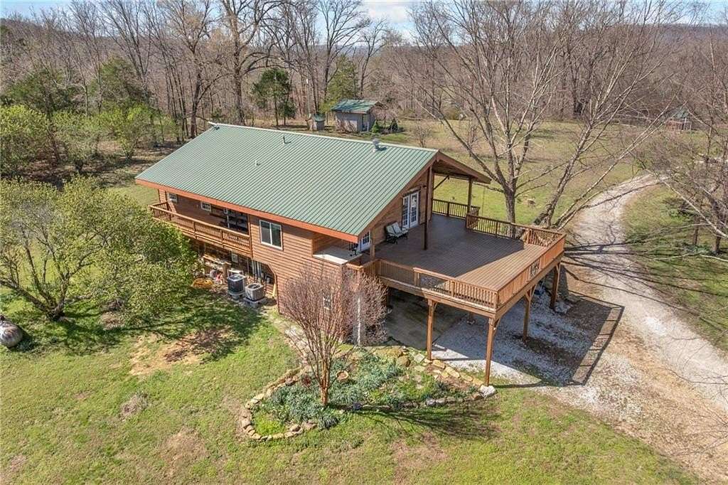 41.8 Acres of Recreational Land with Home for Sale in Alpena, Arkansas