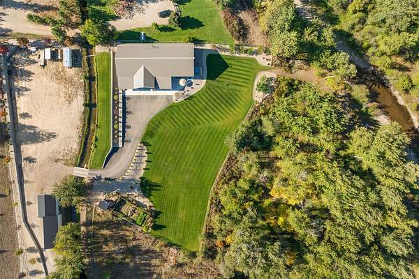 4.76 Acres of Land with Home for Sale in Lolo, Montana