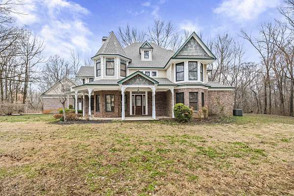 5.72 Acres of Land with Home for Sale in Millington, Tennessee