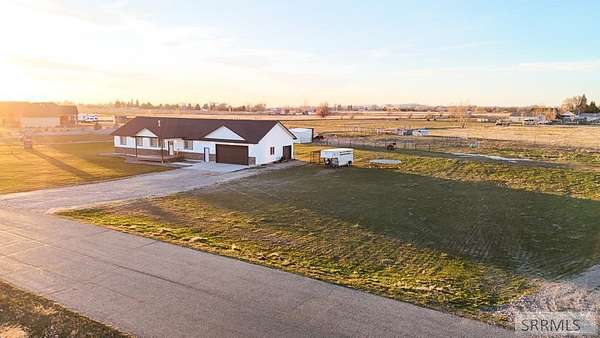 6.82 Acres of Land with Home for Sale in Rigby, Idaho