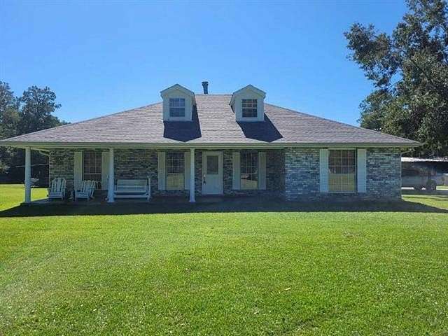 9.83 Acres of Land with Home for Sale in Loranger, Louisiana