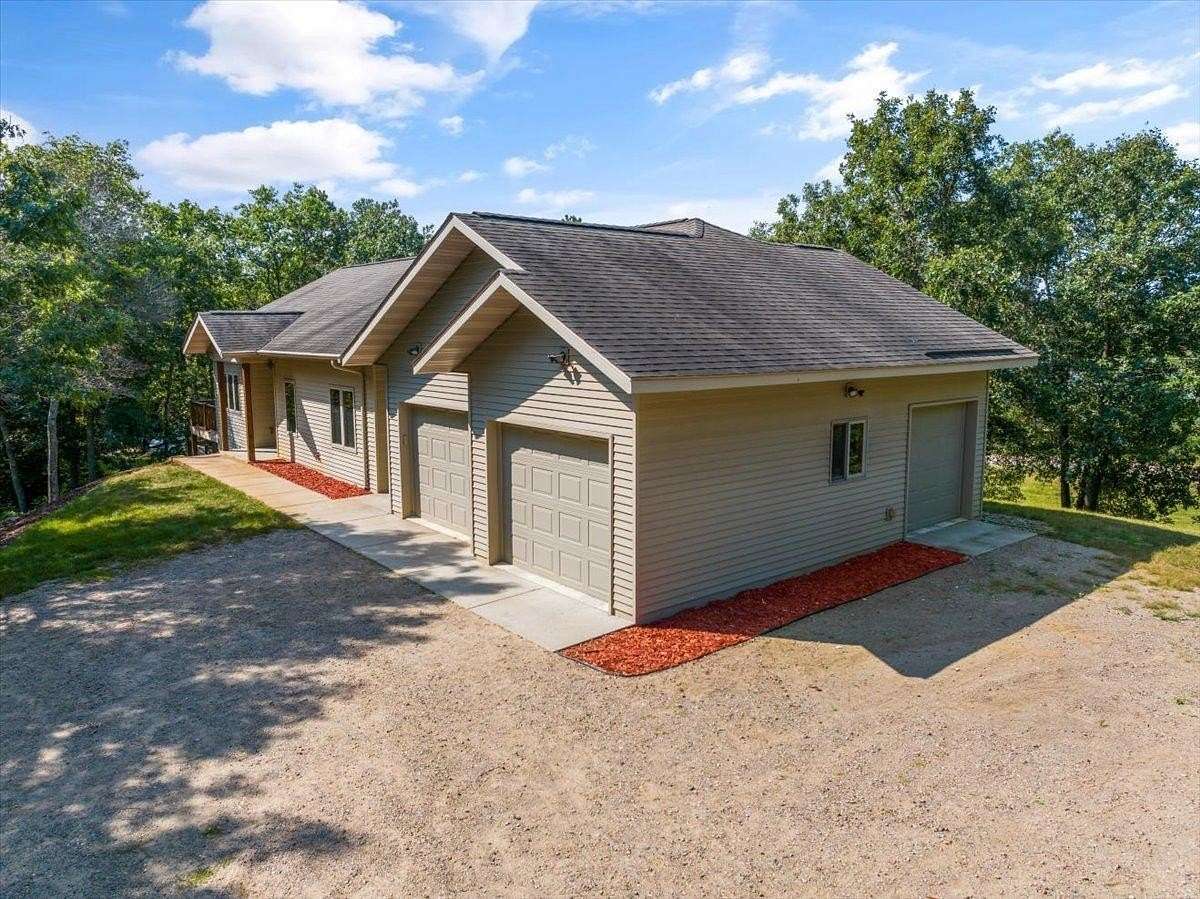 5.4 Acres of Land with Home for Sale in Breezy Point, Minnesota