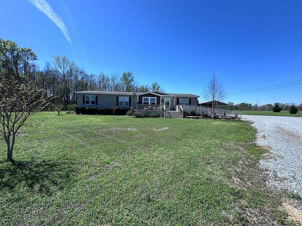 5.86 Acres of Land with Home for Sale in Slocomb, Alabama