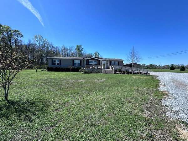 5.86 Acres of Land with Home for Sale in Slocomb, Alabama