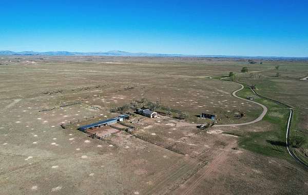 1,290 Acres of Agricultural Land with Home for Sale in Wheatland, Wyoming