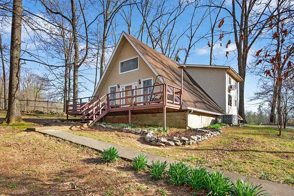 9.54 Acres of Land with Home for Sale in Palmyra, Tennessee