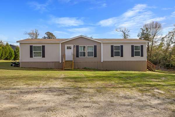 1.65 Acres of Land with Home for Sale in Altha, Florida