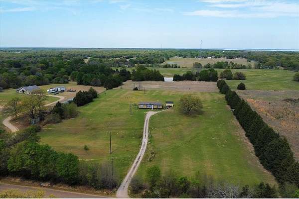 9.81 Acres of Land with Home for Sale in Kemp, Texas